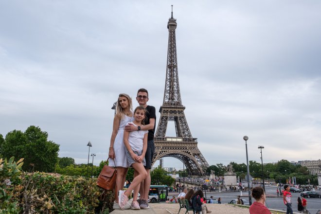 Our family in front of the Eiffel Tower